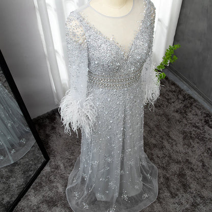 Elegant Nude Dubai Luxury Beaded Feather Evening Gown